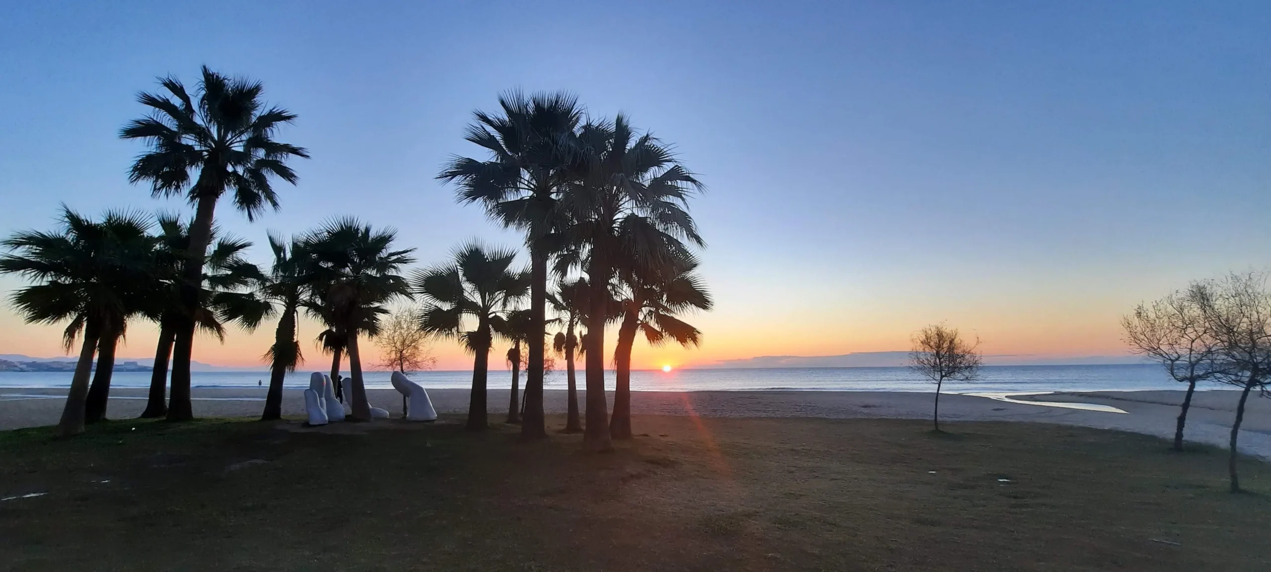 paisaje puesta de sol en la playa